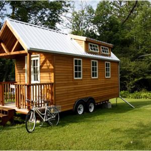 bed in tiny house on wheels